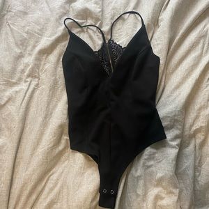 Womens low cut, Lacey back body suit